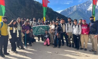 Group of trekkers at Yulla Kanda Trek with Himalayan mountain views in Himachal Pradesh