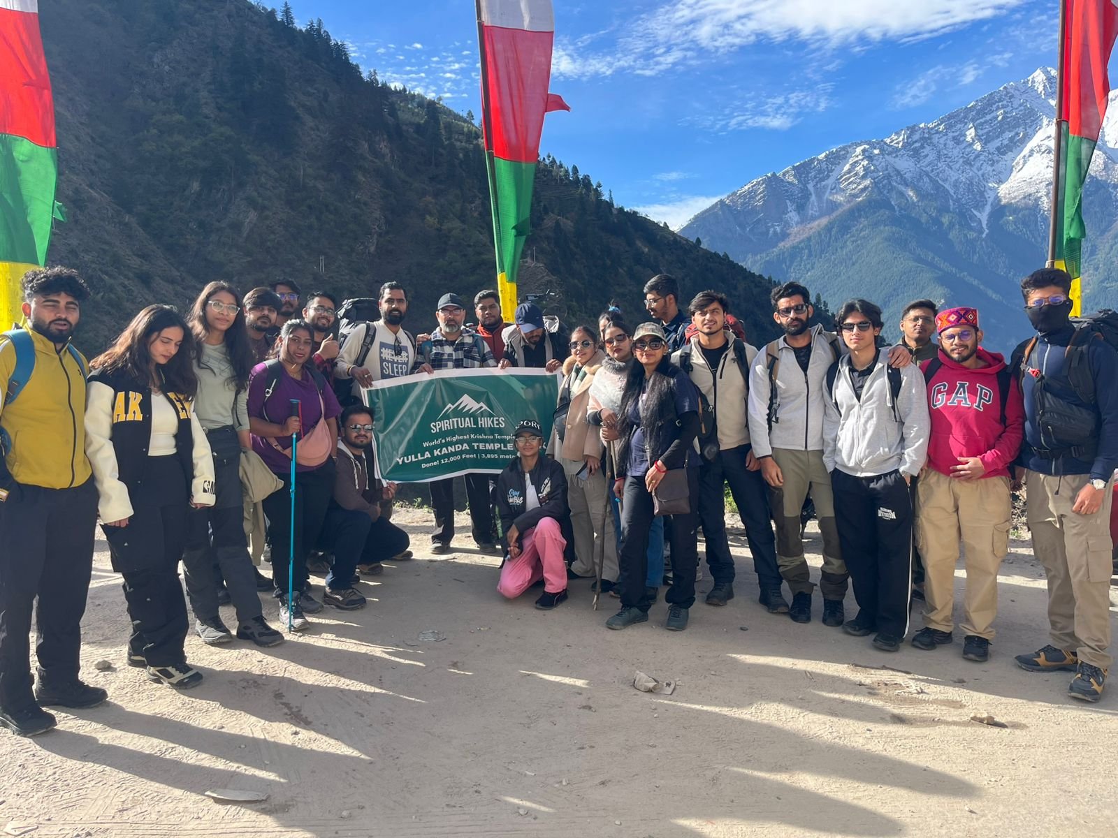 Group of trekkers at Yulla Kanda Trek with Himalayan mountain views in Himachal Pradesh