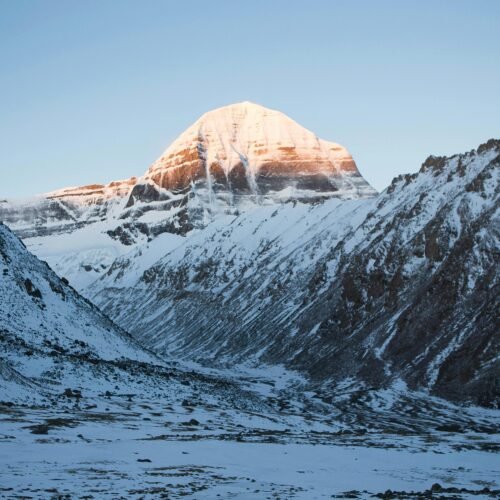 Snow-covered Shrikhand Kailash mountain at sunrise
