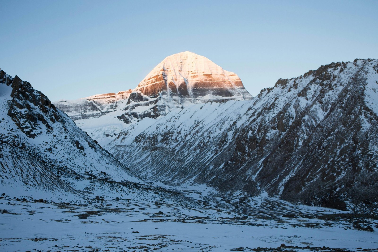 Snow-covered Shrikhand Kailash mountain at sunrise