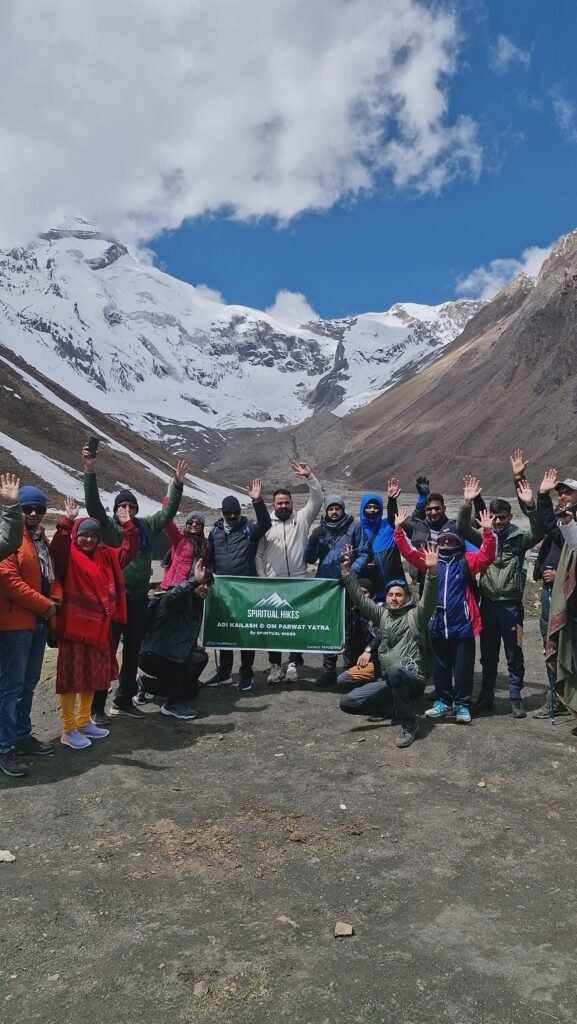 Group trekking at Adi Kailash snowy mountains